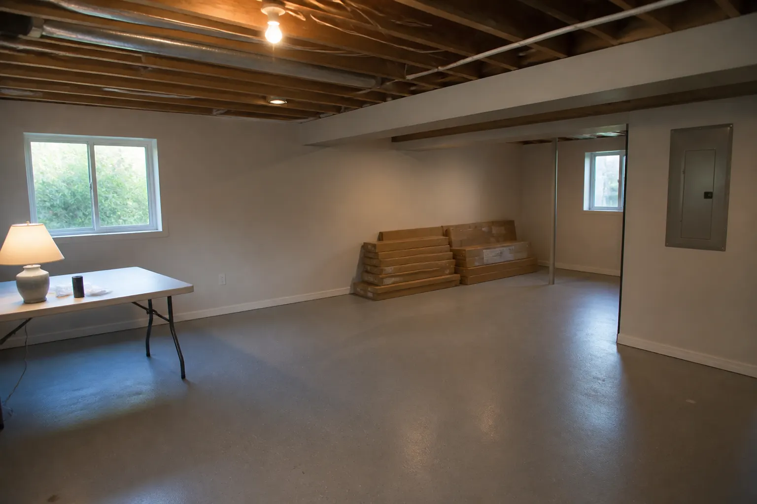 Large coated concrete floor in a residential basement room