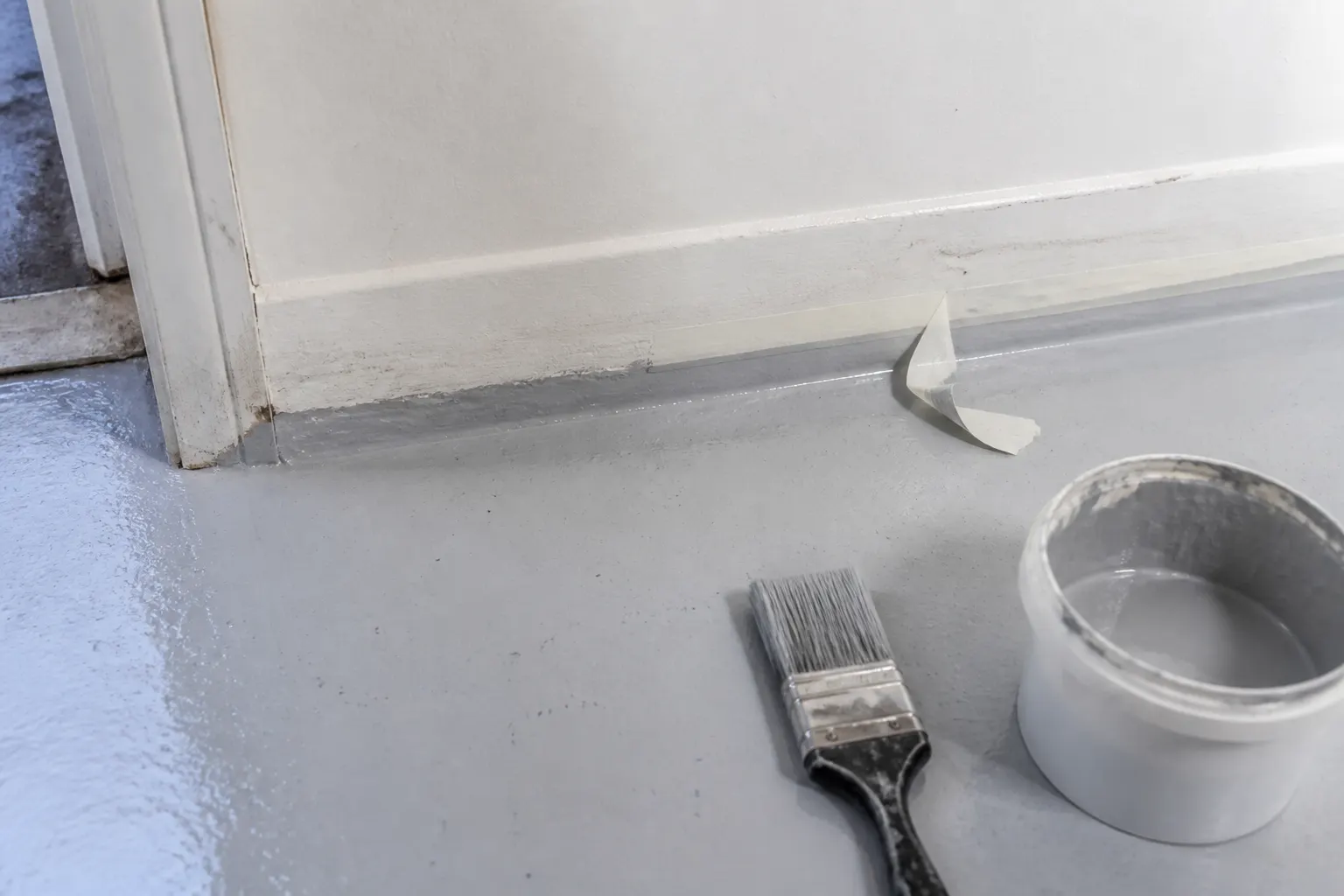 Coated floor edge cut in neatly against the wall